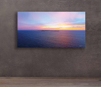 Penguin Island Sunset, Western Australia is a colourful aerial photograph of Rockingham's beautiful coastline available for print in a selection of canvas sizes.